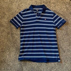 Blue and white stripped boys polo shirt.